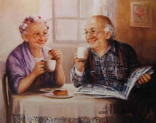 Ældre ægtepar ved bord